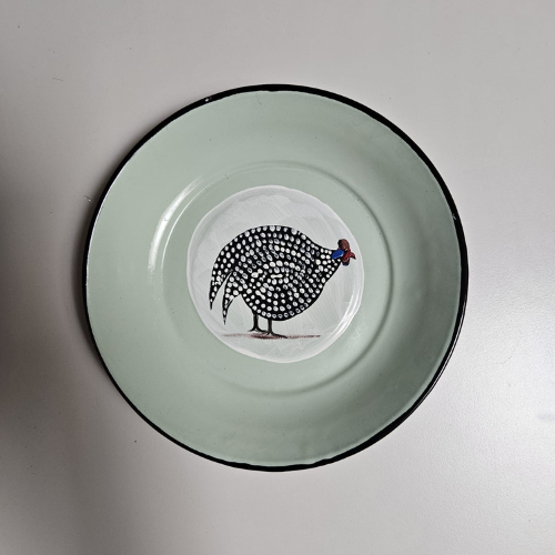 French: Assiette Kango – Pintade casquée à l’avant, Coucher de soleil africain à l’arrière